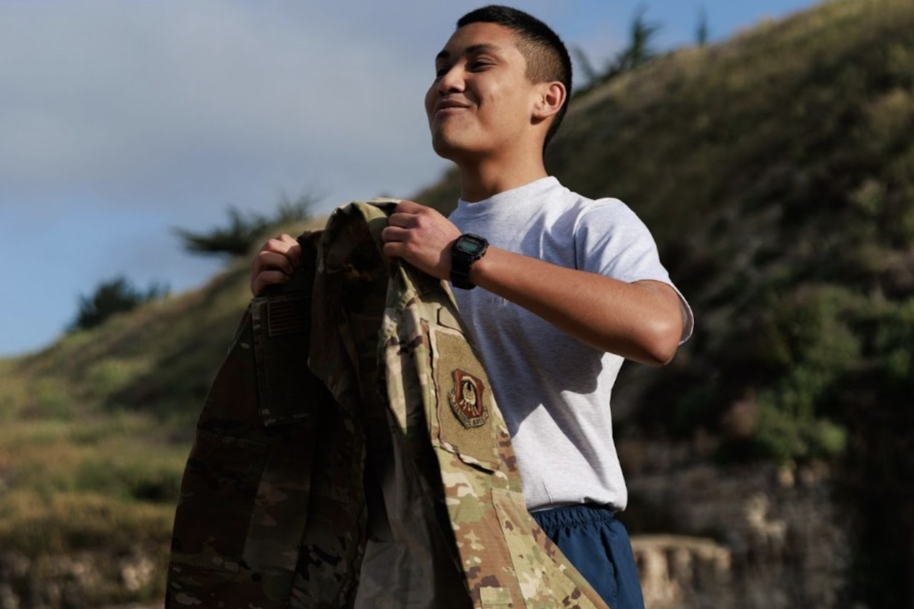Cadet receiving his uniform