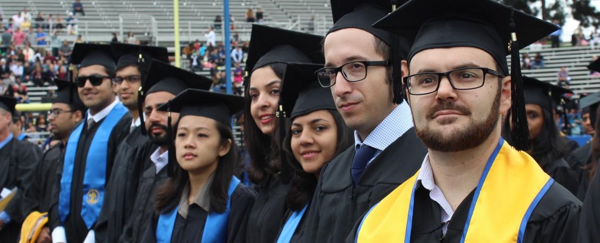 Several students in graduation caps and gowns