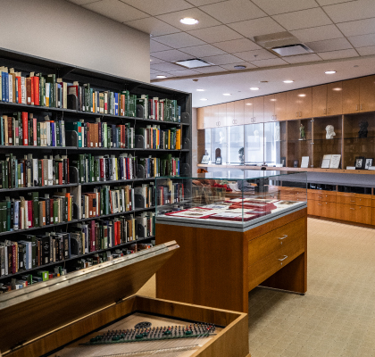 Inside of the Beethoven Center, with bookshelves and display cases