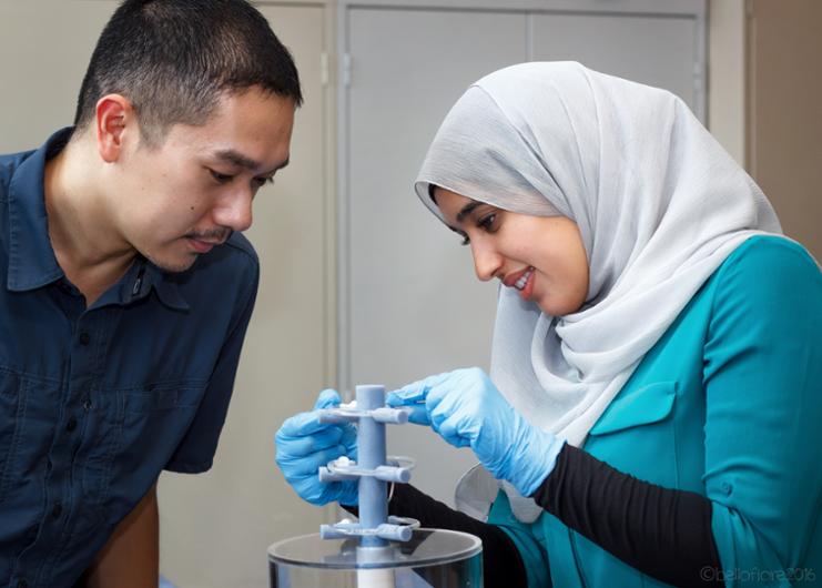 Two students working together on a project.