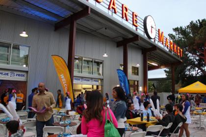 SJSU community members sit outside San Pedro Square Market for an event.