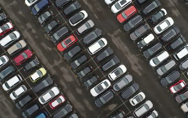 image of cars in a parking lot