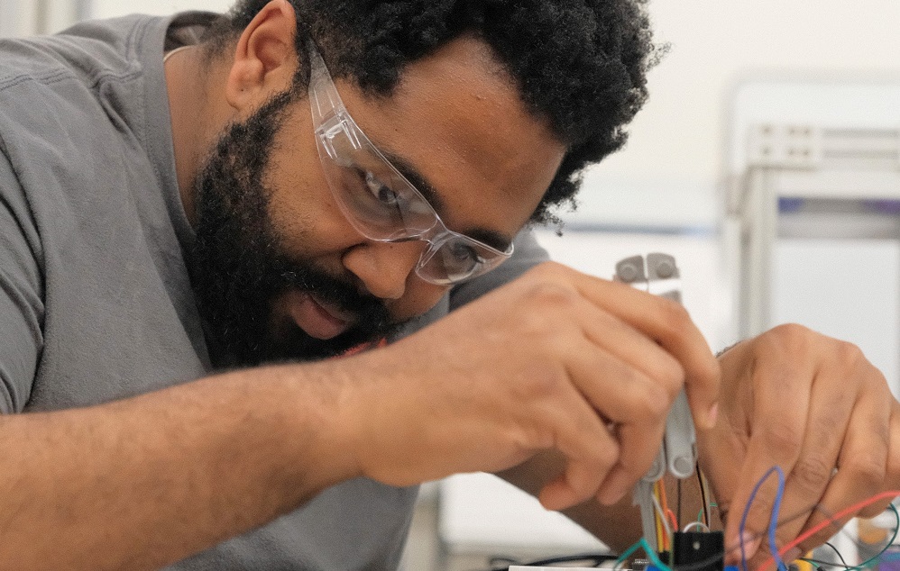 student working on circuitry