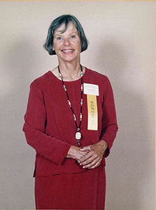 photo of Lois M. Barber in a red dress