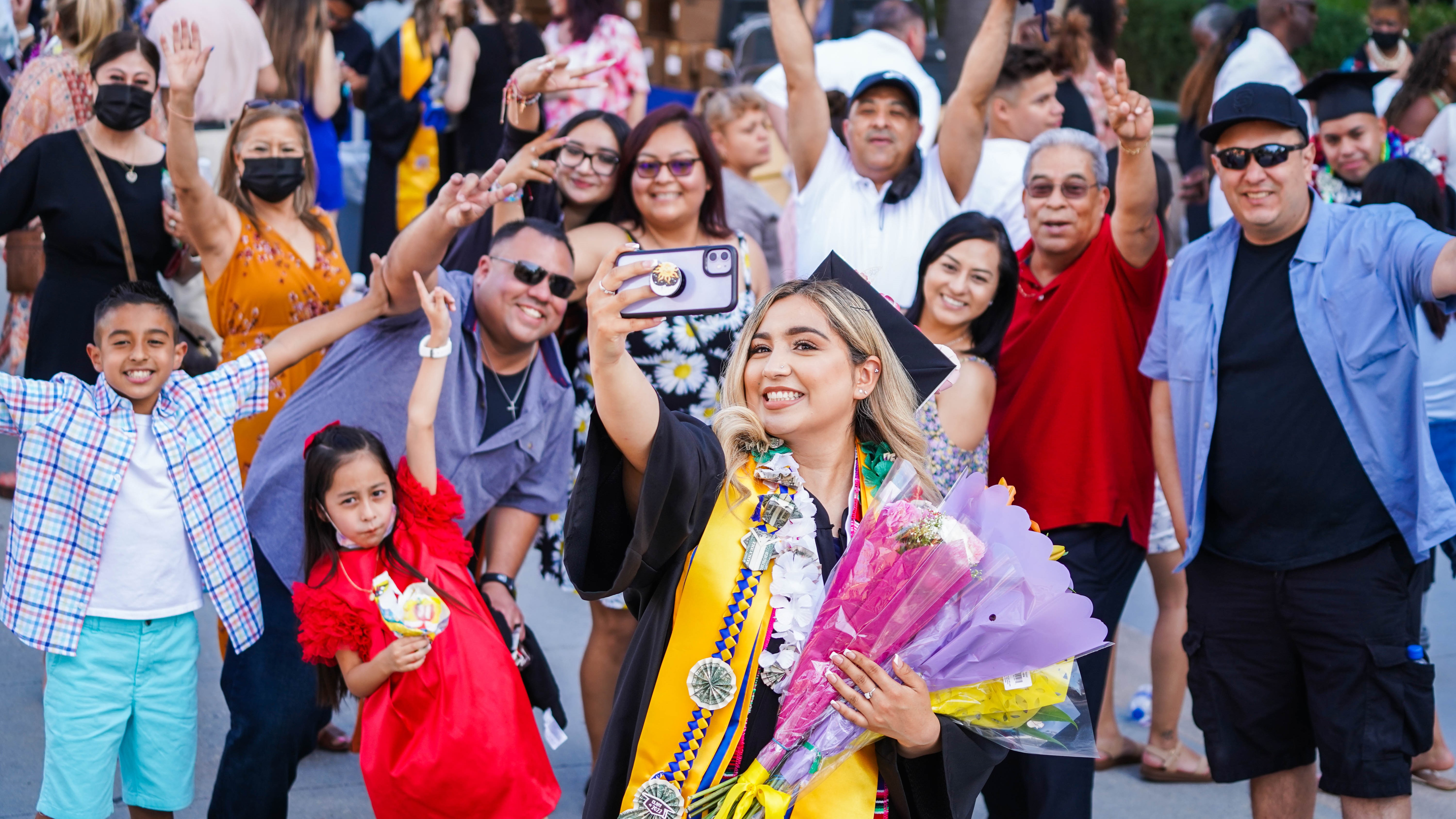 SJSU graduate with family