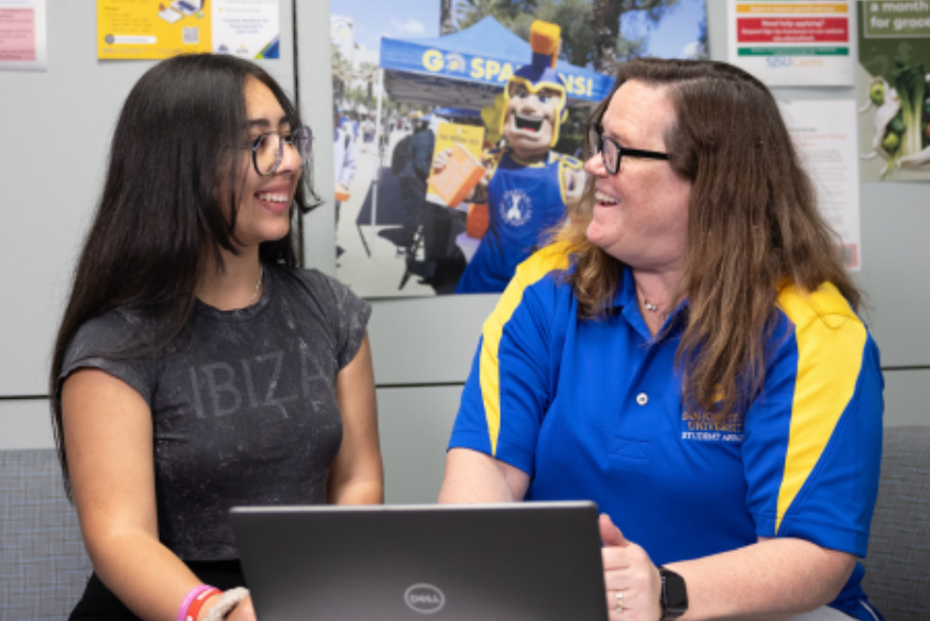 Student and a counselor meeting