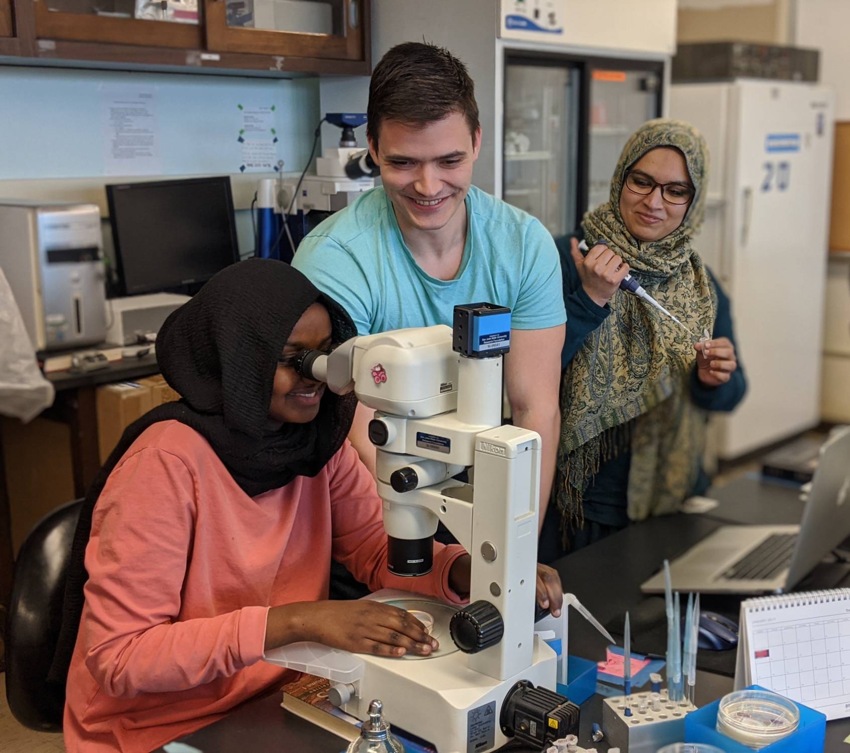 student doing research in biology lab