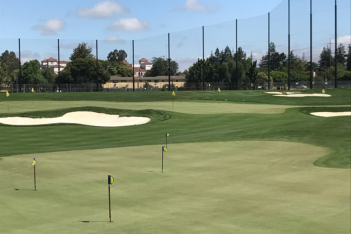 photo of short game area at Spartan Golf Complex, showing putting greens and chipping area