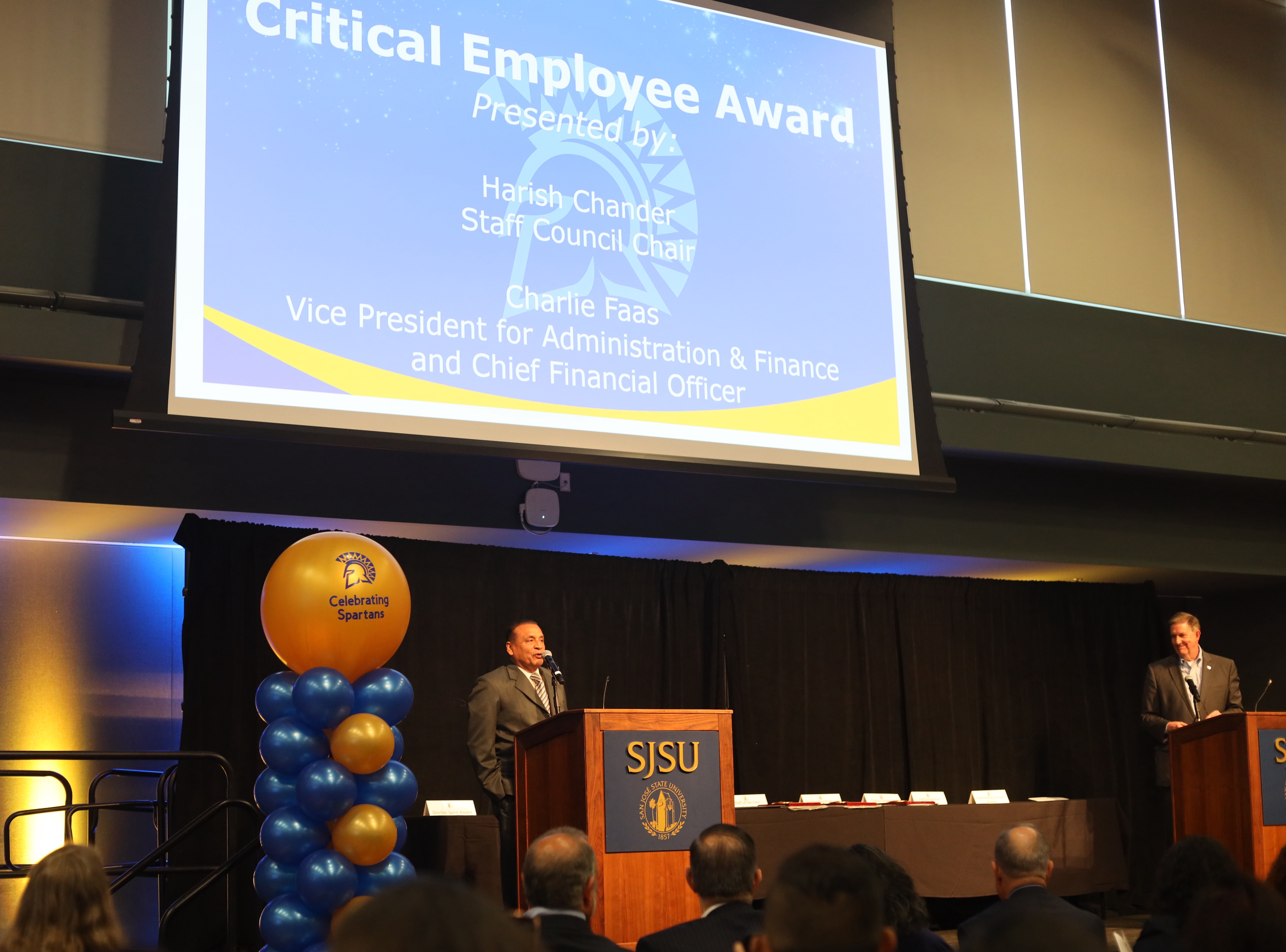 Harish Chander presenting the Critical Employee Awards