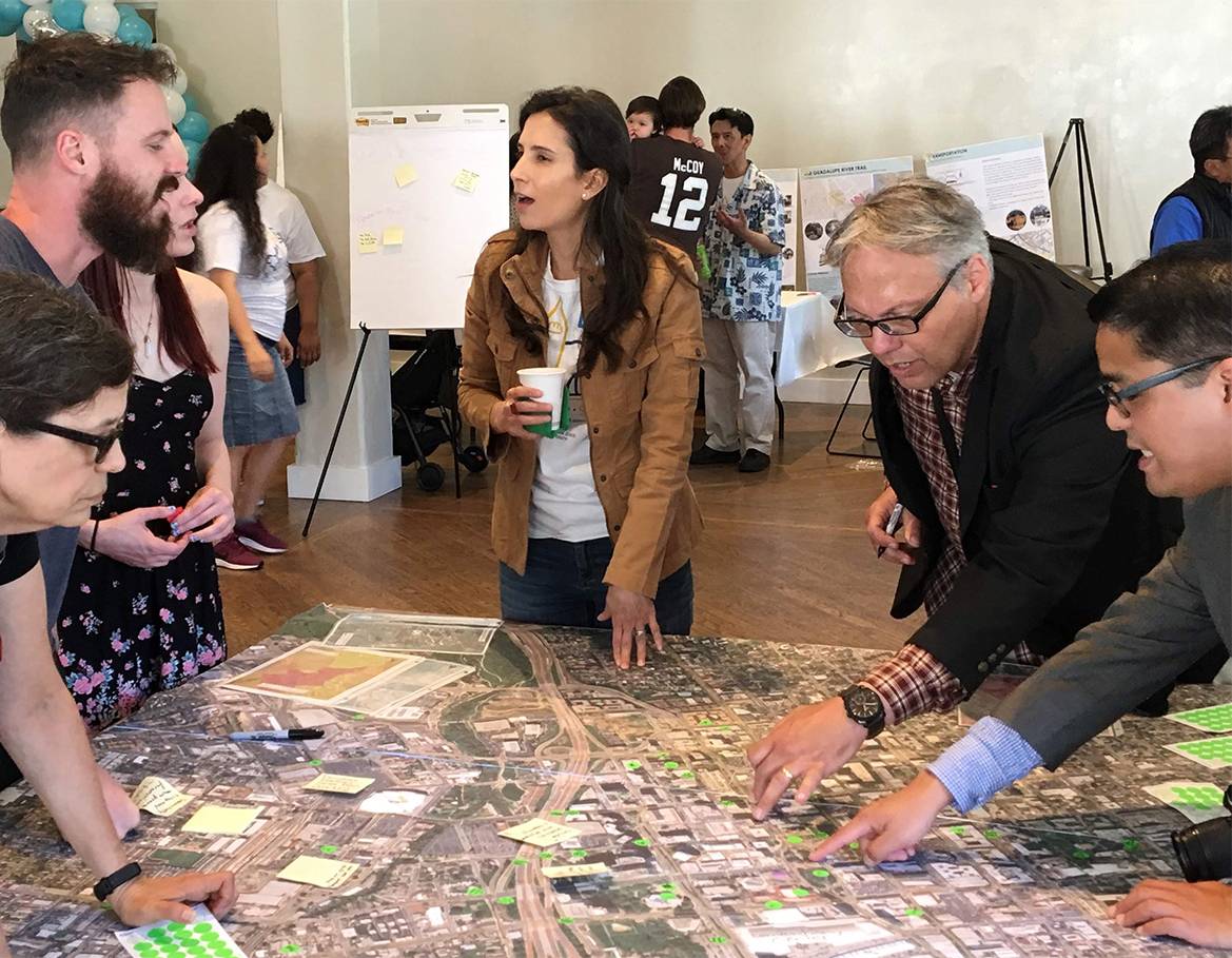 Students and community members review plans